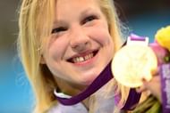 Lithuania's Ruta Meilutyte poses with her gold medal